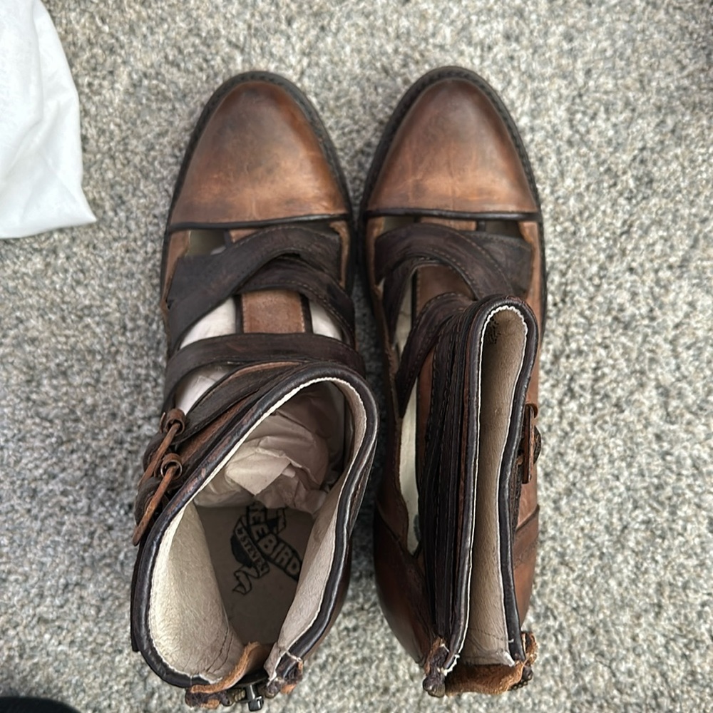 Brand New Freebird “ Ruby “ SZ 7 Color is Brown.